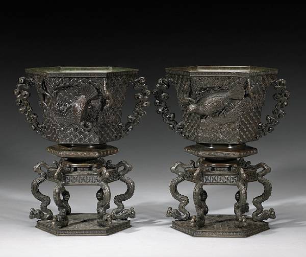 Appraisal: A pair of bronze two-section jardinieres Taisho Early Showa Period