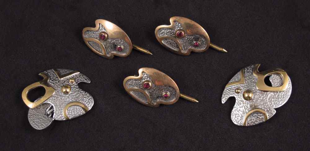 Appraisal: FREEFORM K GOLD STERLING AND RUBY CUFFLINKS AND STUD SET