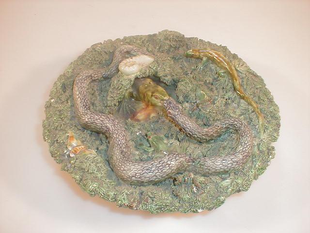 Appraisal: A Pallisey type Portuguese relief mould plate encrusted with lizards