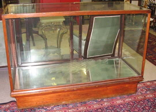 Appraisal: AN ANTIQUE GLASS AND MAHOGANY SHOWCASE American c The case