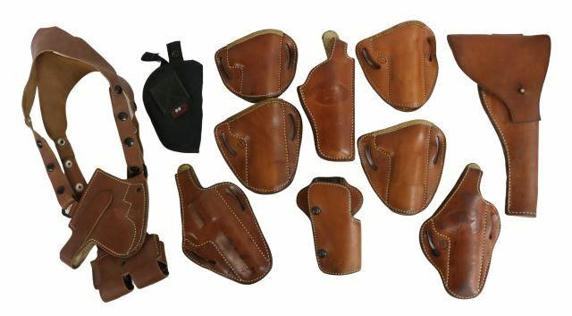 Appraisal: lot of Pistol holsters cartridge belt magazine holder leather belt