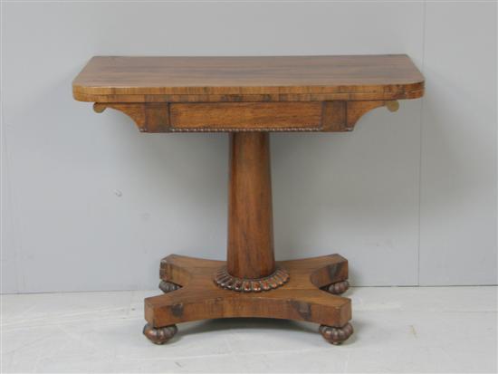 Appraisal: Rosewood folding card table th century on spreading circular column