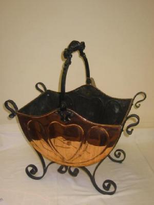 Appraisal: A COPPER LOG BASKET of semi circular form with waved