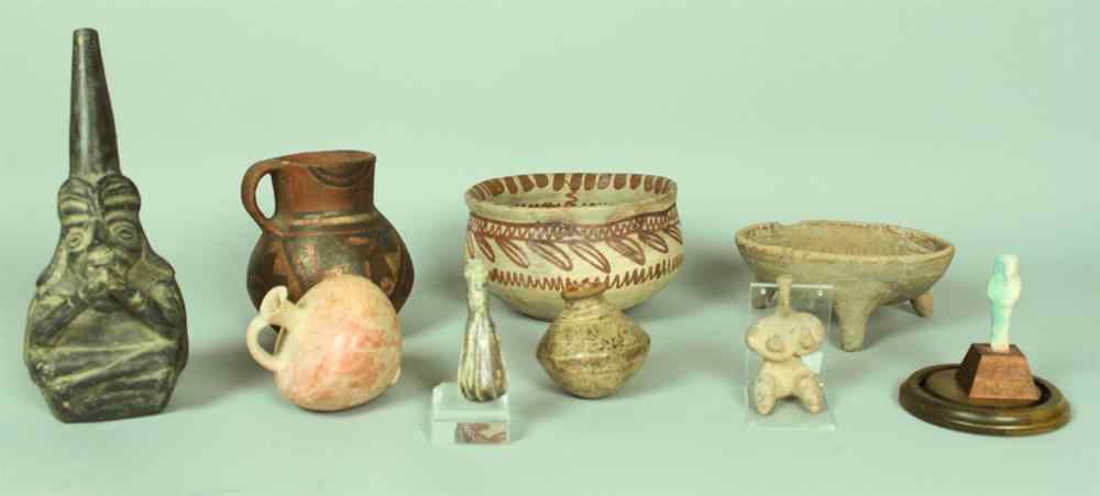 Appraisal: COLLECTION OF POTTERY PIECES Including a black pottery vessel cast