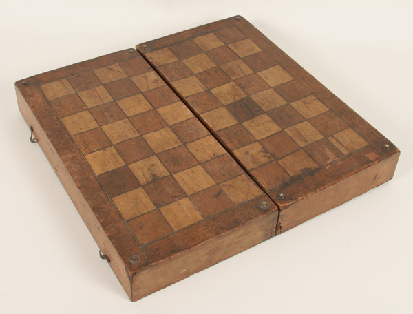 Appraisal: Primitive folk art game board box veneered surface with carved