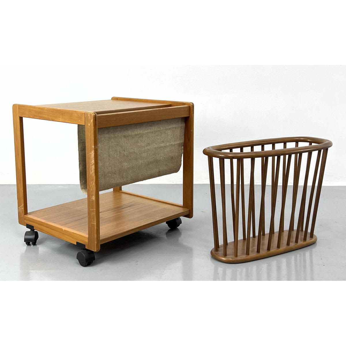 Appraisal: Mid Century Modern Magazine racks Teak Rolling Magazine Rack and