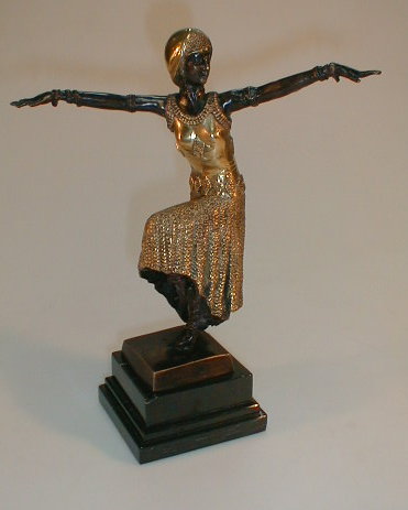 Appraisal: After Chiparus A two coloured bronze figure of a dancer