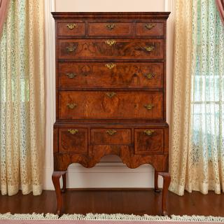 Appraisal: George II figured walnut tall chest on stand George II