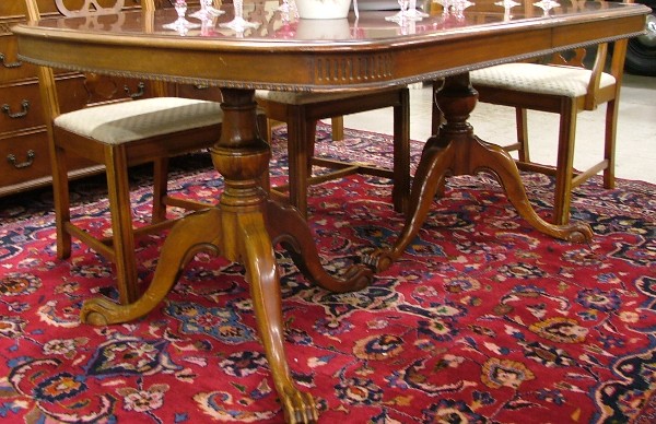 Appraisal: CHIPPENDALE STYLE MAHOGANY DINING TABLE WITH TWO LEAVES American mid