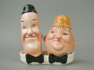 Appraisal: Beswick Laurel Hardy figural cruets on stand modelled as the