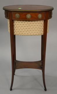 Appraisal: Small French style mahogany sewing stand with lift top and