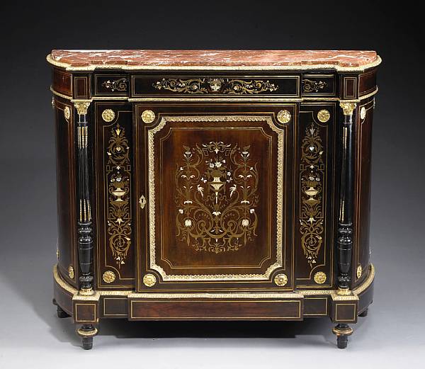 Appraisal: A Napoleon III brass shell and ivory inlaid ebonized meuble