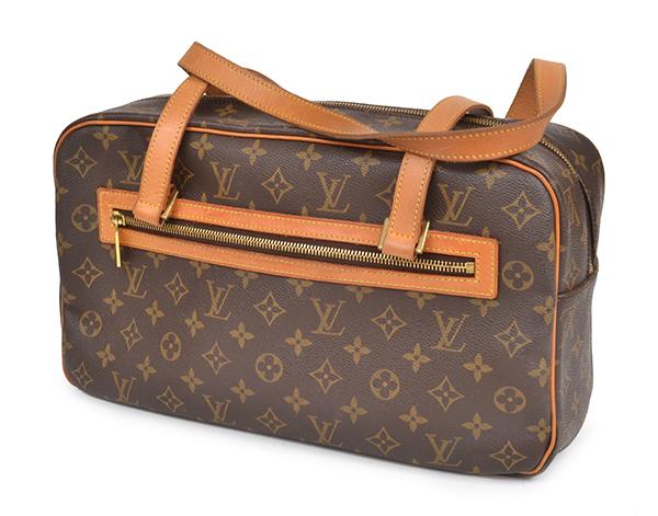 Appraisal: A MONOGRAM CANVAS LOUIS VUITTON STYLE HAND BAG INTERIOR MARKED