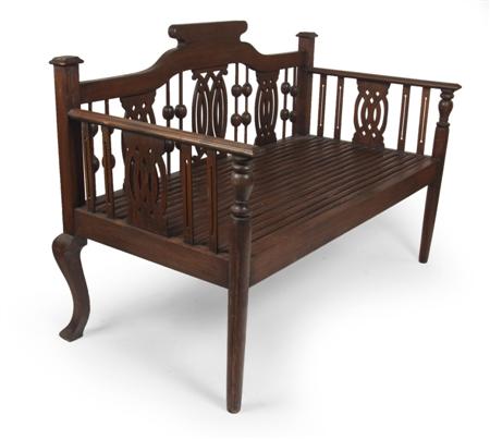 Appraisal: A Victorian mahogany bench the shaped top-rail over fretwork splats