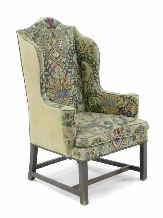 Appraisal: A Hepplewhite Style Wingback Armchair having a needlepoint upholstered back