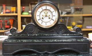 Appraisal: Continental marble clock th Century having a round glass door