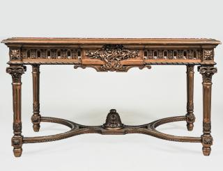 Appraisal: CARVED FRUITWOOD CENTER TABLE With marble inset top above the