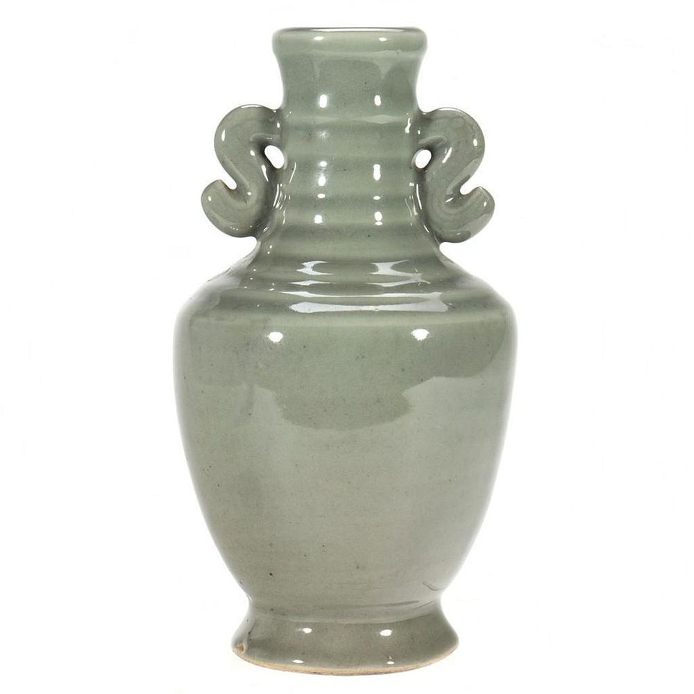 Appraisal: Deco Pottery Vase The grey-green stick neck vase with scrolled