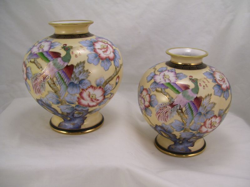 Appraisal: Pair Nippon Handpainted Vases Hand painted vases depicting peonies and