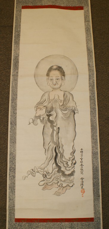 Appraisal: Japanese Painted Paper Scroll depicting Buddha with Calligraphy and seals