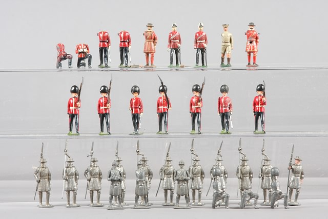 Appraisal: Lot of Britains hollow cast guards together with unpainted hollow