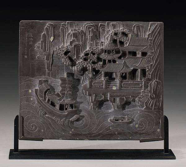 Appraisal: A carved duan stone plaque Worked in high relief with