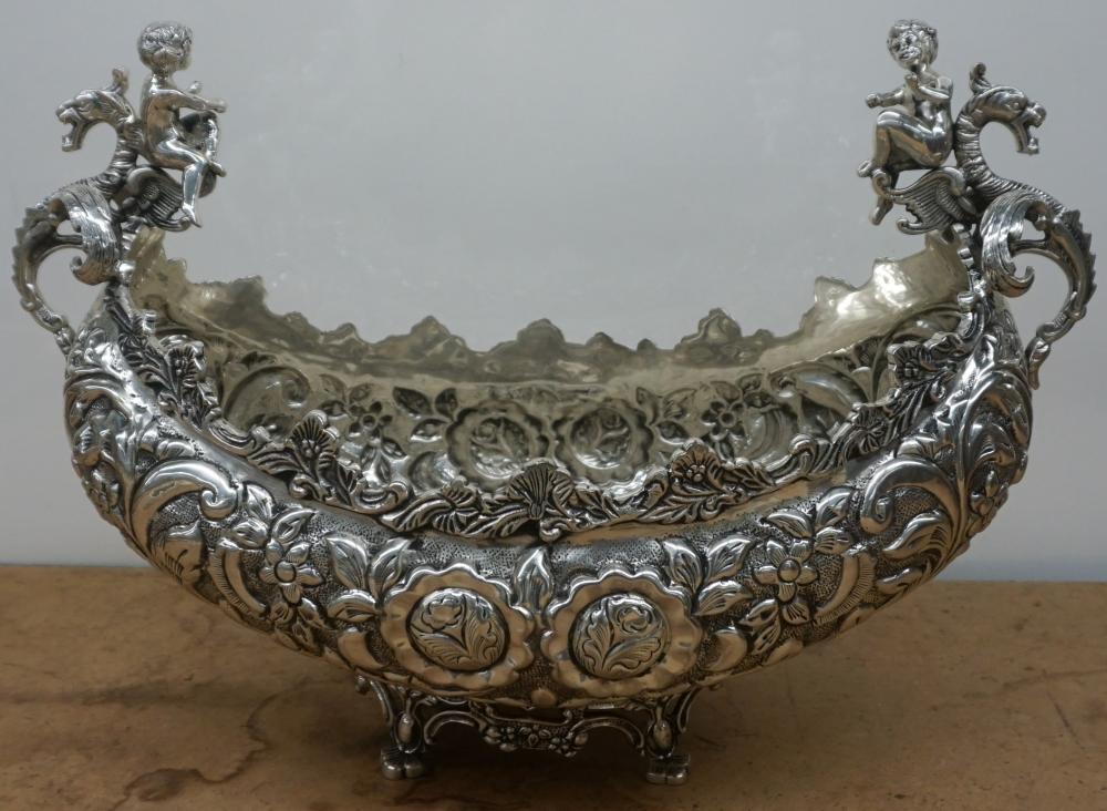 Appraisal: Hammered Silverplate Putti and Dragon Handled Center Bowl x x