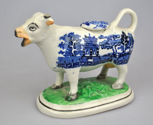 Appraisal: A Victorian cow cream with blue and white transfer printed