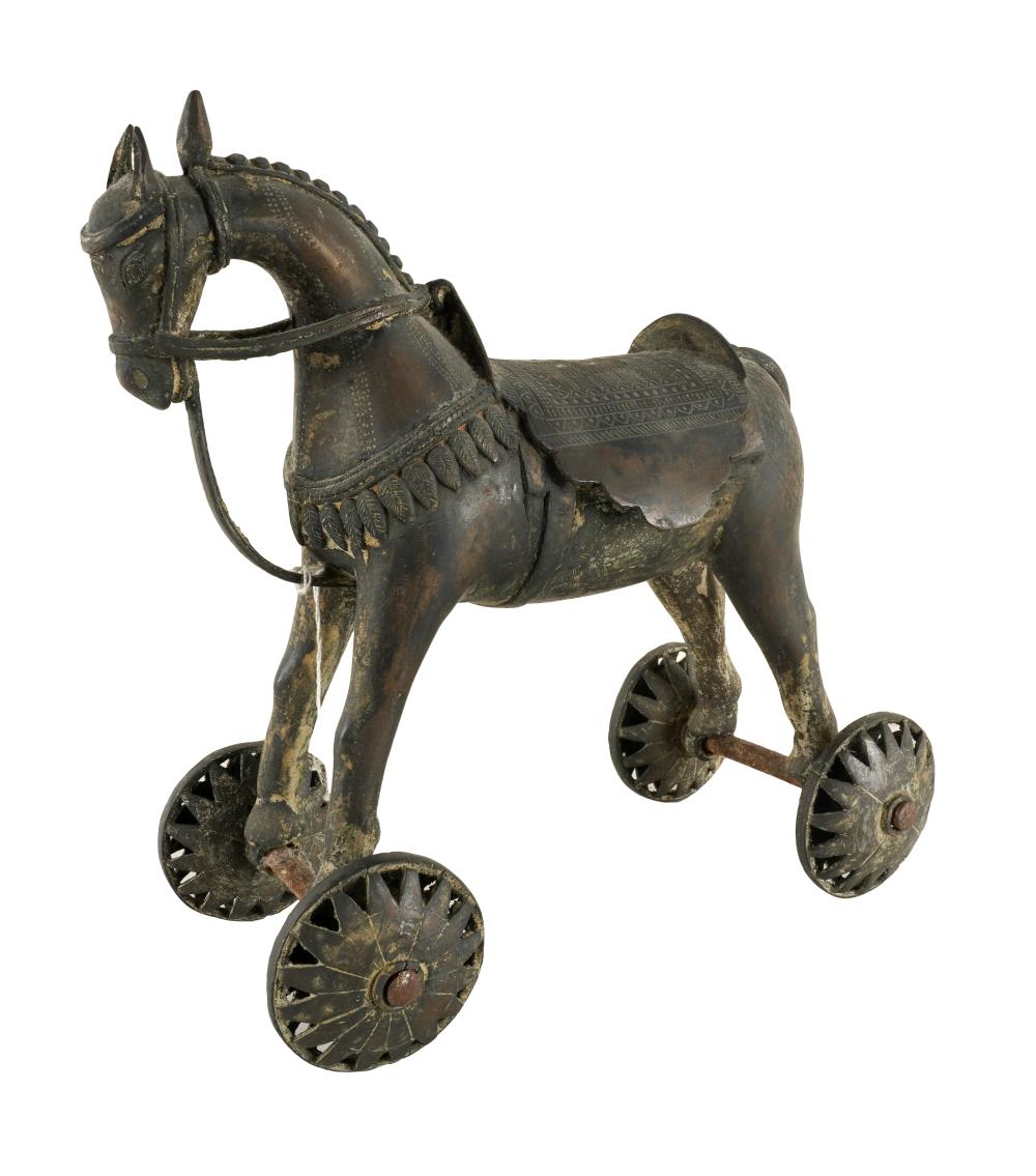 Appraisal: INDIAN METAL HORSE TOYunsigned on four wheels Condition oxidized throughout