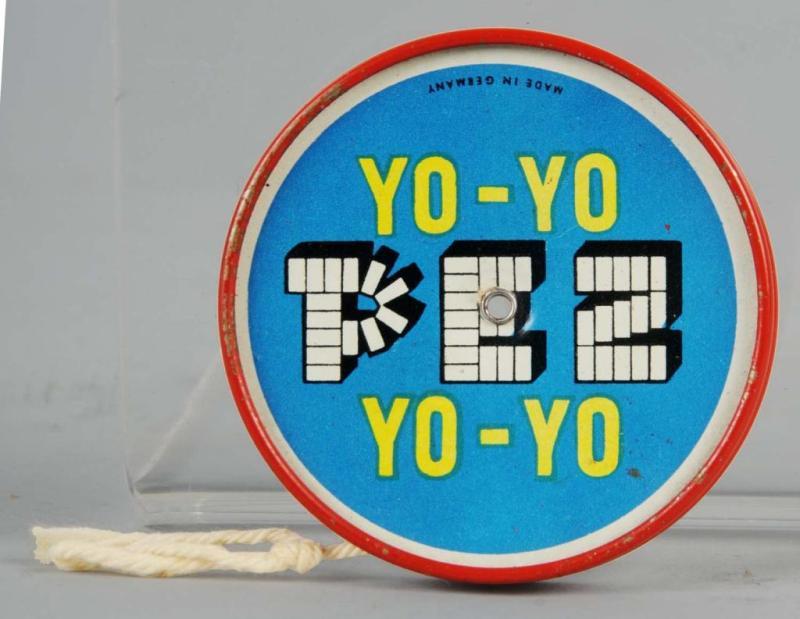 Appraisal: Early Pez Tin Yo-Yo Description Rare Condition Near Mint