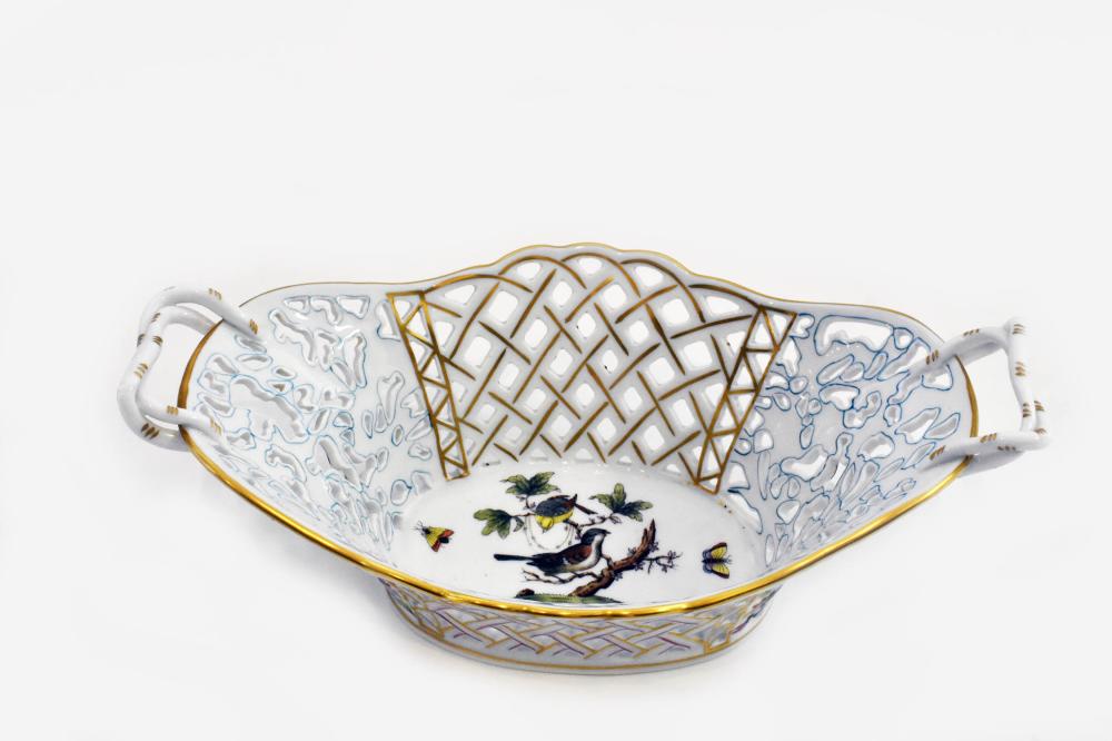 Appraisal: HEREND RETICULATED PORCELAIN BASKET-FORM BOWLBlue factory mark The oval shaped