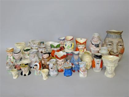 Appraisal: Group of Toby ceramic creamersComprising a friar an older lady