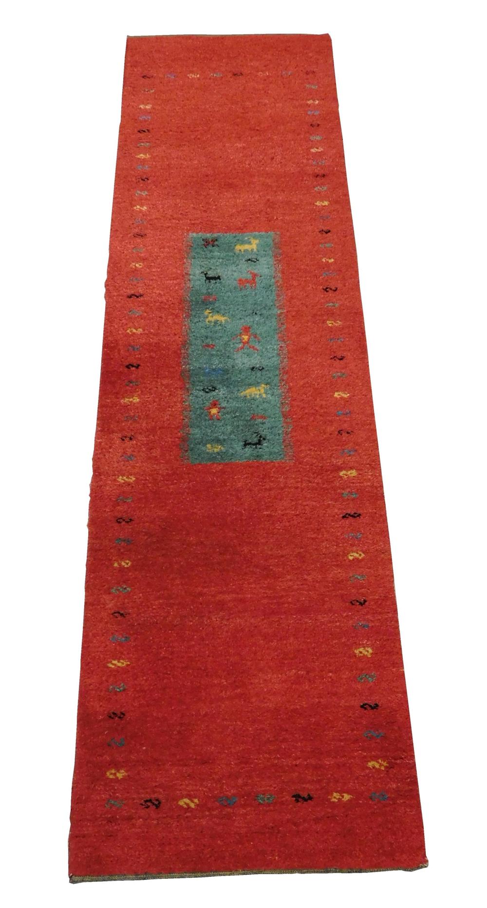 Appraisal: RUG Modern Persian Gabbeh runner wool on wool cranberry field