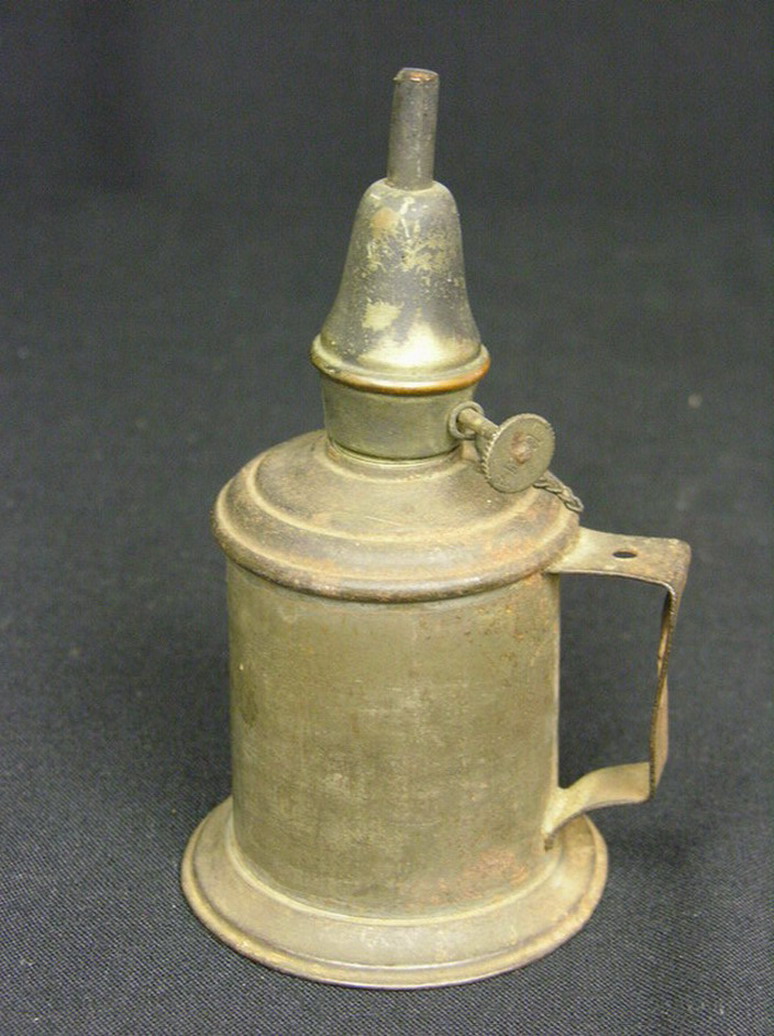 Appraisal: EARLY TIN LAMP MARKED LUMA Nail holder handle Size by