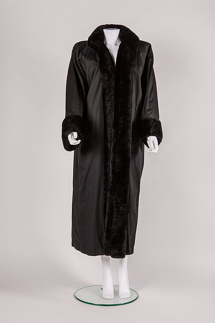 Appraisal: A vintage Yves Saint Laurent fur lined coat fur to