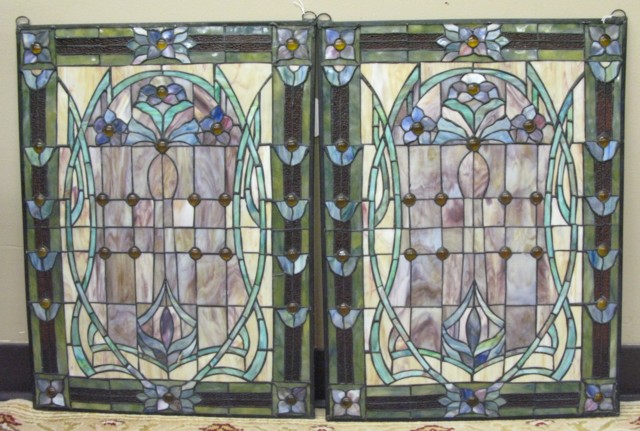 Appraisal: PAIR STAINED AND LEADED GLASS WINDOW PANELS having stylized floral