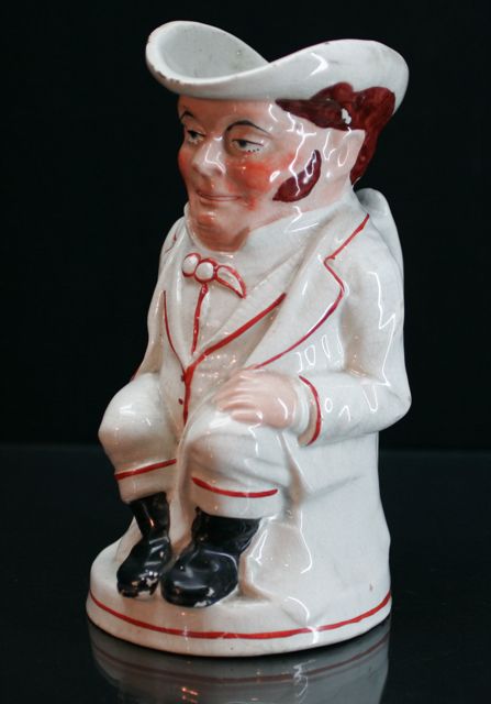 Appraisal: A Staffordshire Toby jug damage