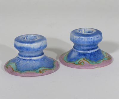 Appraisal: Inspiration' a pair of Clarice Cliff Bizarre candlesticks painted in