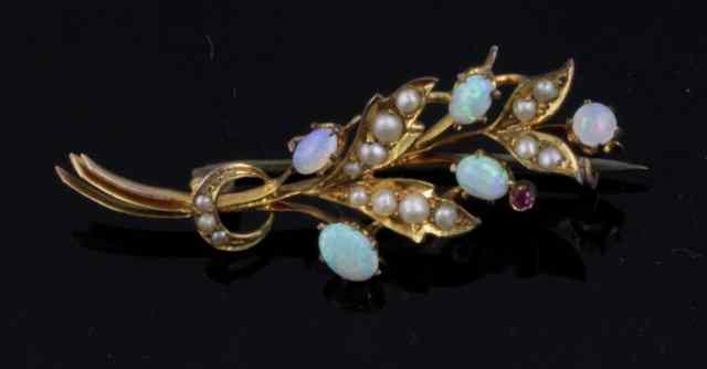 Appraisal: A floral opal and multi-gem set spray brooch