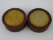 Appraisal: A pair of early th c circular boxes in formed