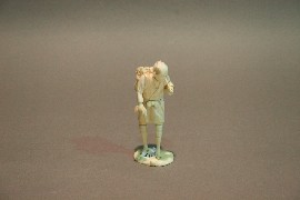 Appraisal: A Japanese ivory figure of a man with a basket