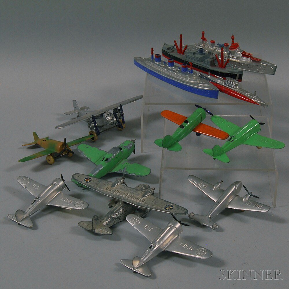 Appraisal: Four Tootsietoy Painted Die-cast Metal Toy Ships and Nine Airplanes