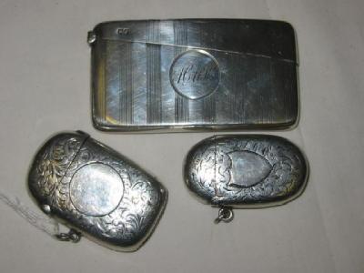 Appraisal: A CARD CASE of curved oblong form with initialled cartouche