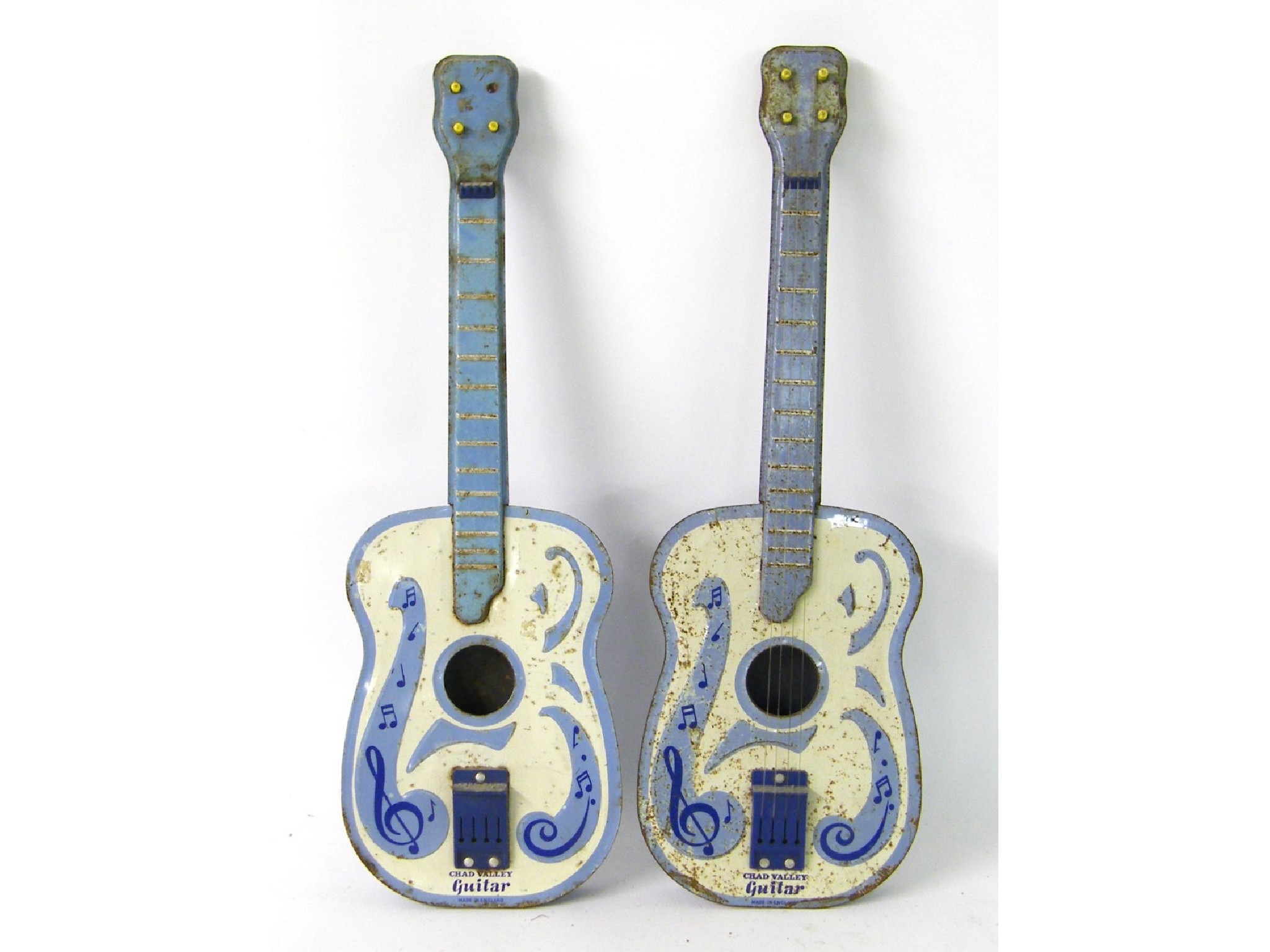 Appraisal: Two Chad Valley tin guitars