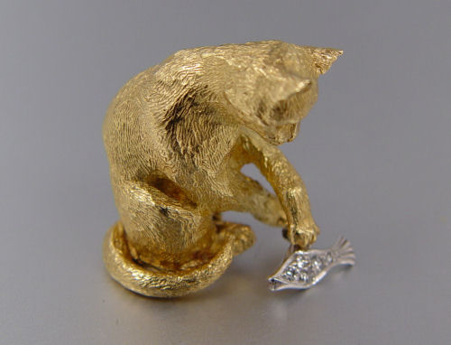 Appraisal: K TIFFANY CO CAT AND FISH FIGURAL PIN K yellow