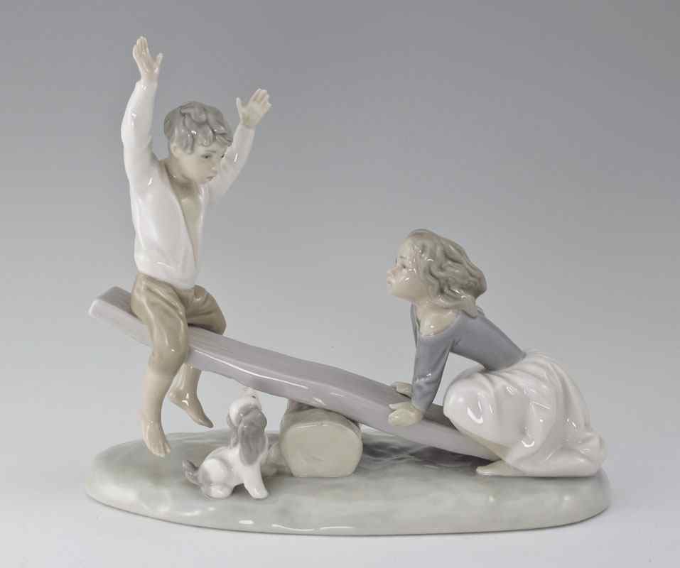 Appraisal: LLADRO PORCELAIN FIGURINE SEE-SAW aka Swing Fulgencio Garcia designer issued