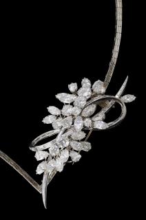 Appraisal: Platinum Diamond Brooch featuring six round brilliant diamonds nine pear