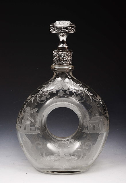 Appraisal: A LATE TH DUTCH GLASS LOOP DECANTER engraved with houses