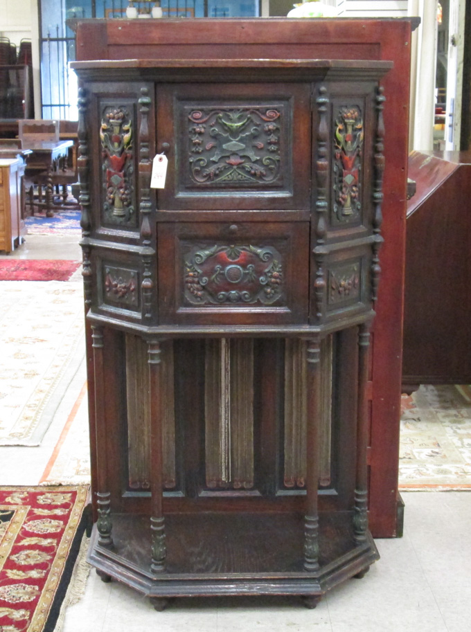 Appraisal: JACOBEAN STYLE CARVED OAK CABINET ON STAND American c s