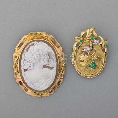 Appraisal: TWO GOLD BROOCH PENDANTS th C Bacchante shell cameo in